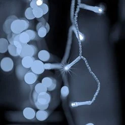 FUNPENY Christmas Icicle Lights Outdoor, 360 LED 29.5 FT Clear Wire Christmas Lights 8 Modes, Curtain Fairy String Lights With 60 Drops For Xmas Wedding Party Tree Holiday Decoration, White -Funpeny Shop 416MeyFxUBL