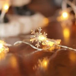 FUNPENY 100 LED Christmas Snowflake String Lights, 49 FT Waterproof Connectable Fairy Light Plug In With 8 Modes For Indoor Outdoor Wedding Xmas Tree Party Garden Decorations, Warm White -Funpeny Shop 41fcrsENkUL