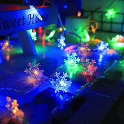 FUNPENY 50 LED Christmas Snowflake String Lights, Snow Christmas Decorations Light With 8 Modes, Battery Operated Christmas Fairy Light With Remote For Xmas Party Decor Indoor Outdoor (Multi-Colored) -Funpeny Shop 51ueKGGUc2L